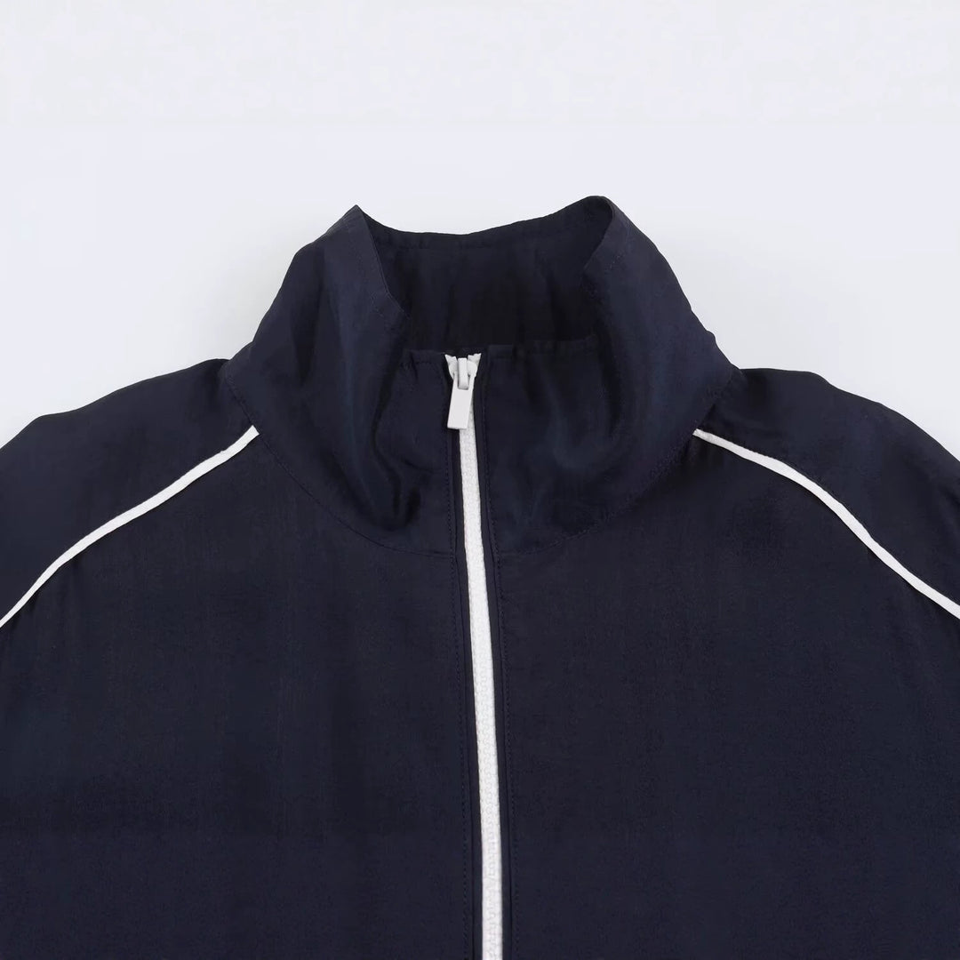 Damen Kurz geschnittene Windjacke mit hohem Kragen und elastischem Saum Echo Archiv