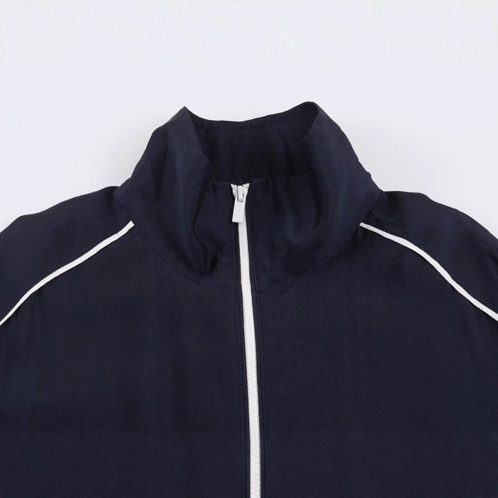 Damen Kurz geschnittene Windjacke mit hohem Kragen und elastischem Saum Echo Archiv