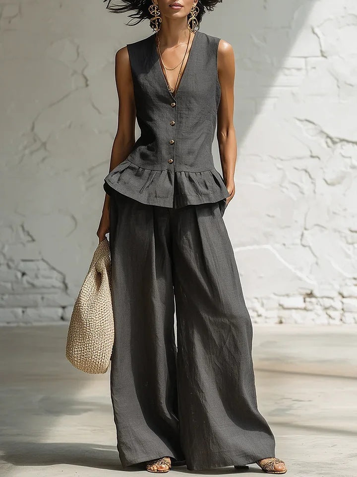 Damen lässiger Jumpsuit mit peplum Schnitt und Knopfdetails Echo Archiv
