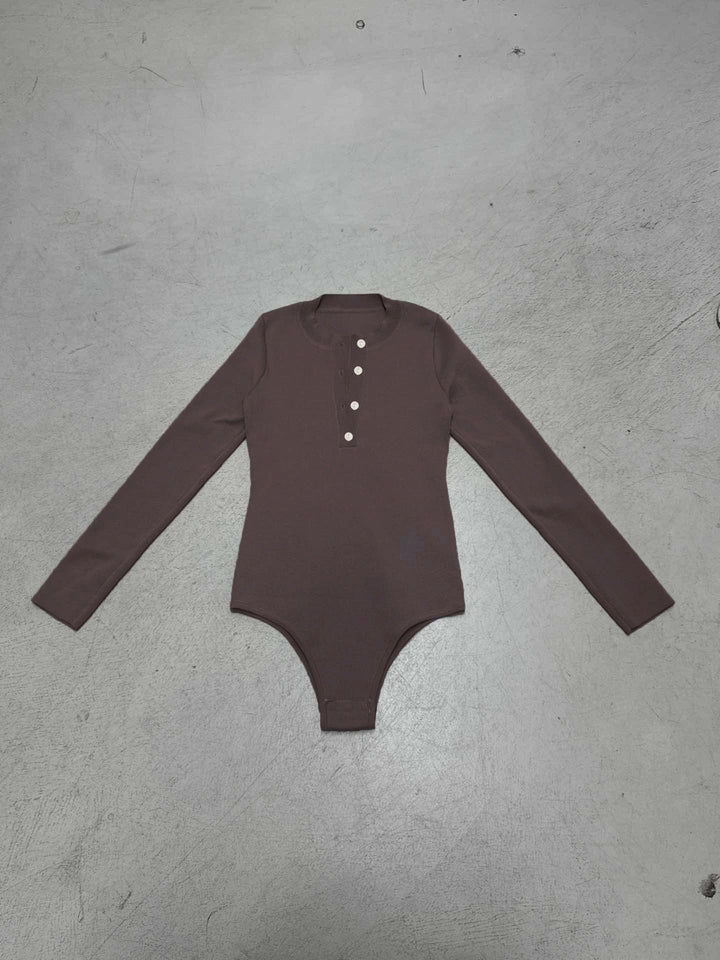 Damen Langarm-Bodysuit mit Knopfleiste und Rippstruktur Echo Archiv