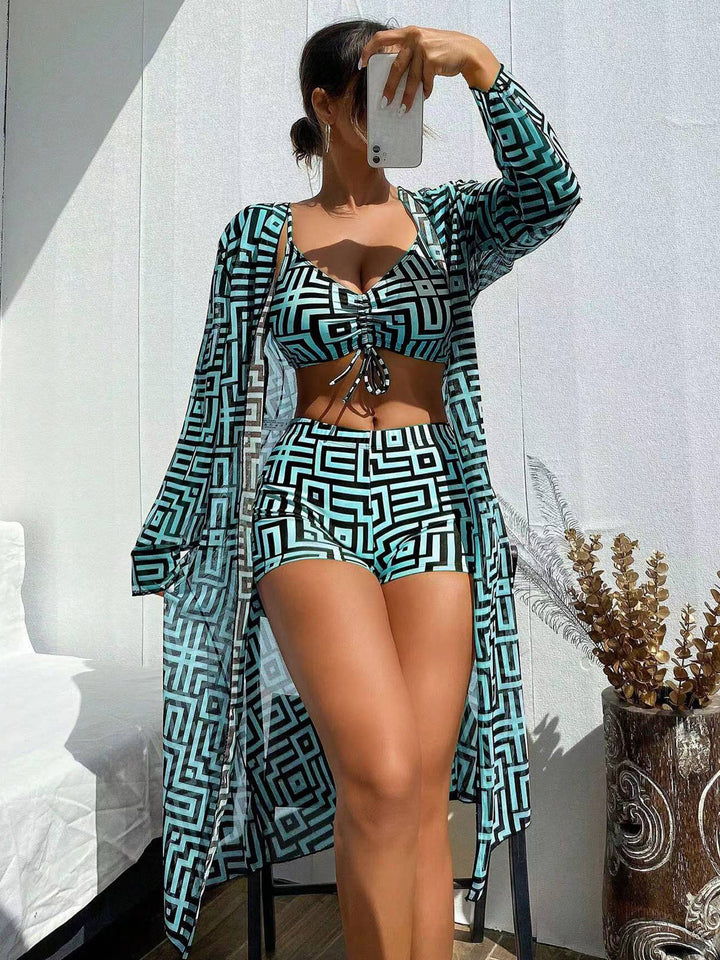 Damen Badeoutfit mit geometrischem Design und transparenter Kimono Echo Archiv