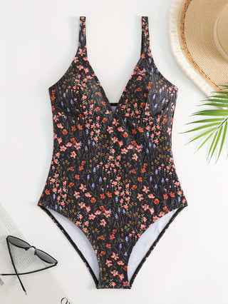 Damen eleganter und figurbetonter Badeanzug mit floralem Design Echo Archiv