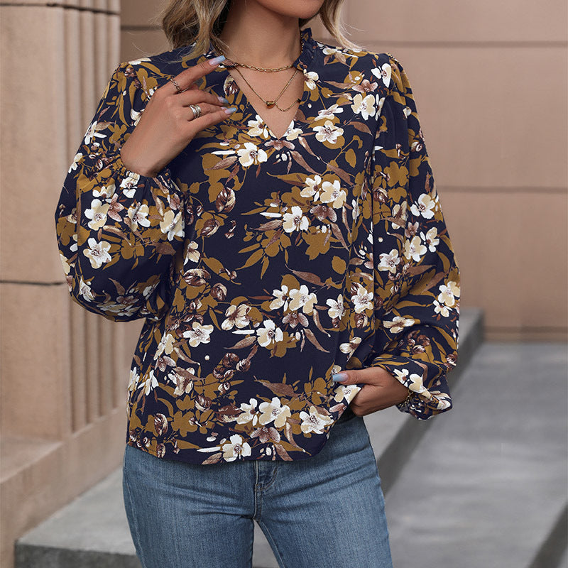 Damen Leichte Chiffonbluse mit floralem Alloverprint, V-Ausschnitt und voluminösen Bündelärmeln Echoarchiv