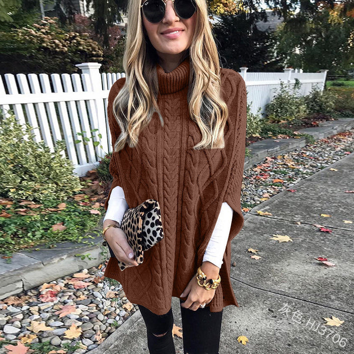 Damen nan kastiger Strickponcho mit hohem Rollkragen, Zopfstruktur und seitlichen Schlitzen Echo Archiv