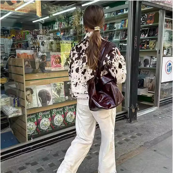 Damen 500+ kurz geschnittene Jacke im Kuhfell‑Look mit Hemdkragen und Pattentaschen Echo Archiv