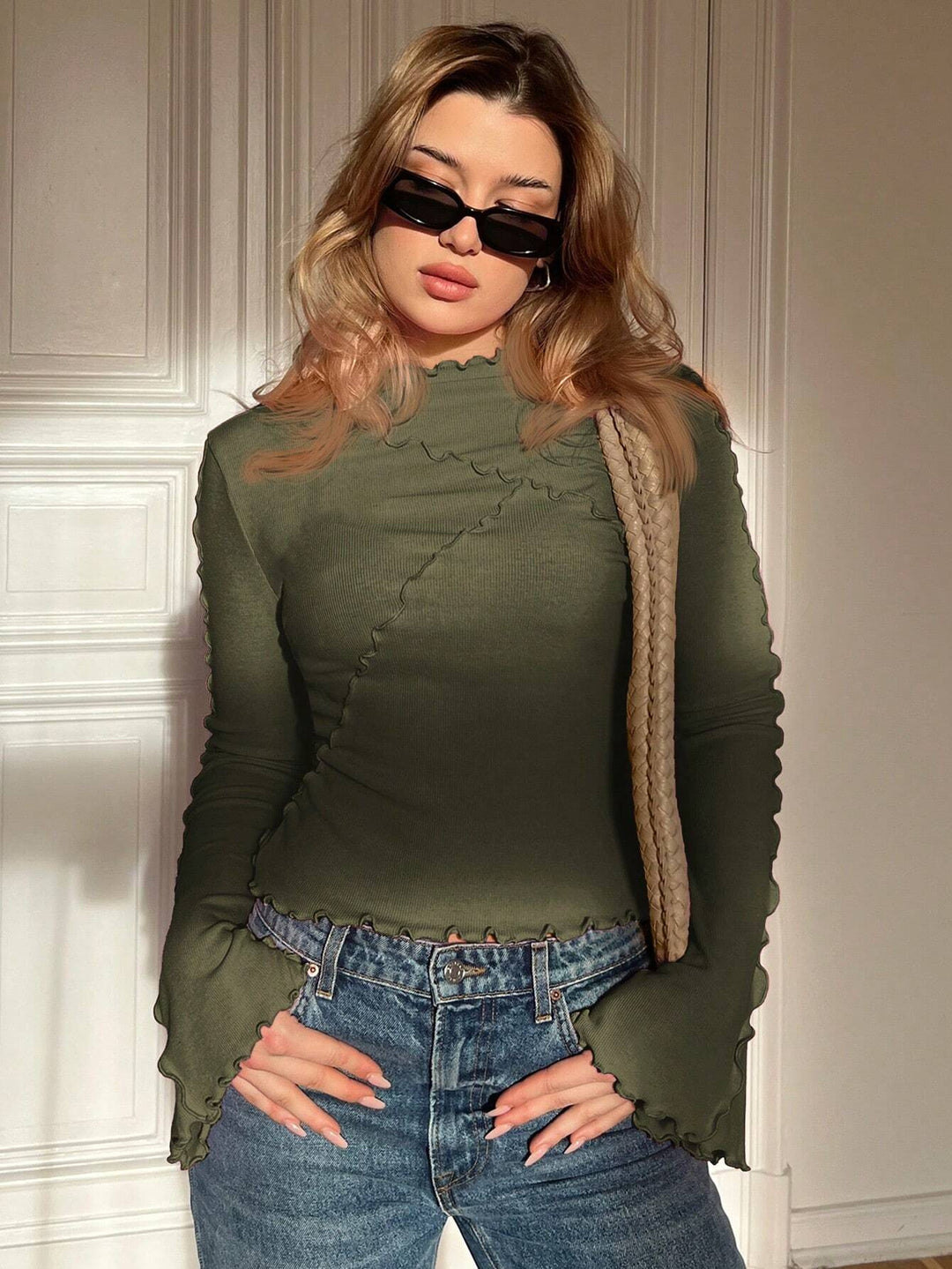 Damen Geripptes Langarmshirt mit Rüschen-Saum und Stehkragen Echo Archiv