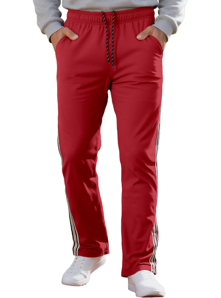Herren nan Retro-Trackhose mit schmal zulaufendem Bein elastischem Bund Tunnelzug und seitlichen Streifen Echo Archiv
