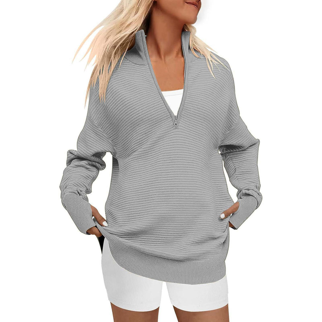Damen Oversize-Feinstrickpullover mit halbem Reißverschluss, Stehkrragen und Daumenloch-Ärmeln Echo Archiv