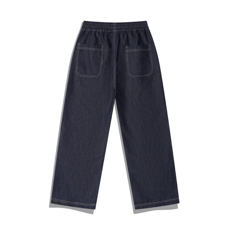 Unisex Weite Denim-Hose mit elastischem Bund, Kordelzug und gesteppter Kniepasse Echo Archiv