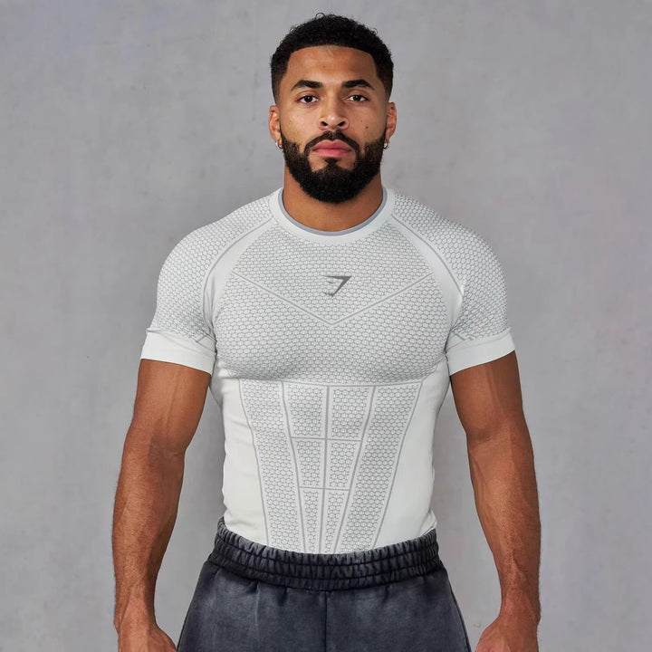 Herren nan muskelmodellierendes Funktionsshirt mit 3D-Struktur und gezielten Kompressionszonen Echo Archiv