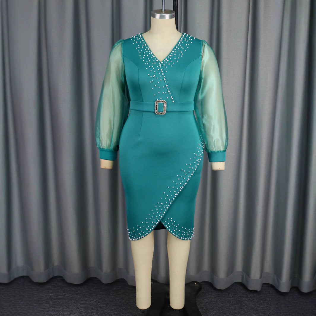 Damen Abendkleid mit eleganten Puffärmeln und funkelnden Applikationen Echo Archiv