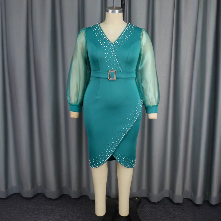Damen Abendkleid mit eleganten Puffärmeln und funkelnden Applikationen Echo Archiv