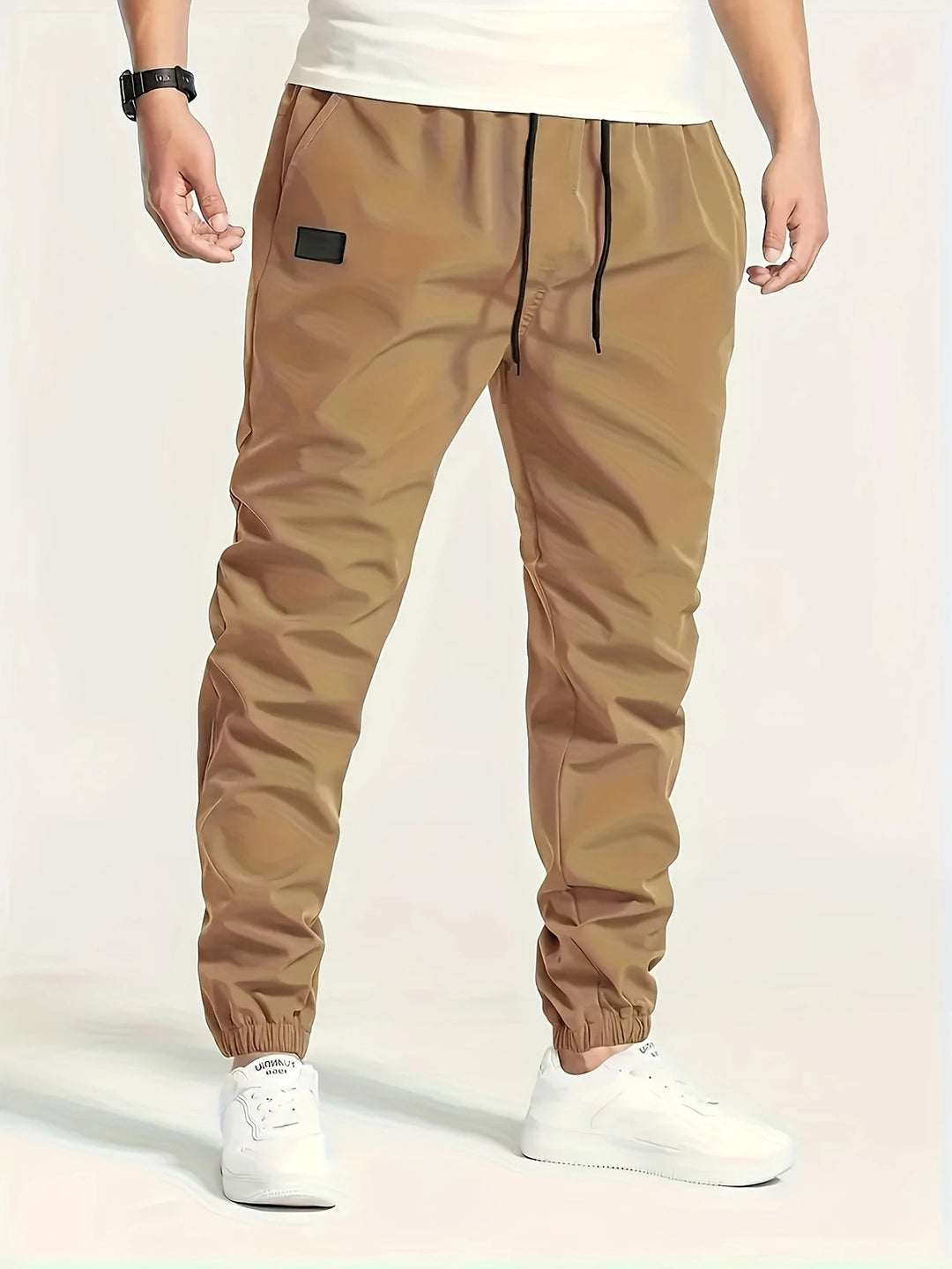 Herren Technische Jogginghose im Tapered‑Utility‑Stil mit elastischem Bund & Knöchelbündchen Echo Archiv