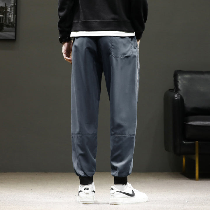 Herren Sportliche Nylon-Joggerhose mit elastischem Bund und seitlichen Kontraststreifen Echo Archiv