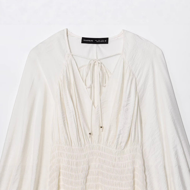 Damen Boho-Bluse mit Smock-Taillenbund, V-Ausschnitt und Ballonärmeln Echoarchiv