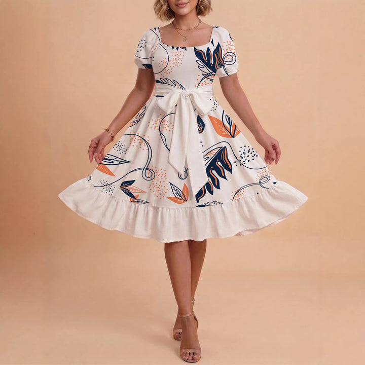 Damen Sommerliches Blumenkleid mit taillierbarem Gürtel und voluminösen Ärmeln Echo Archiv