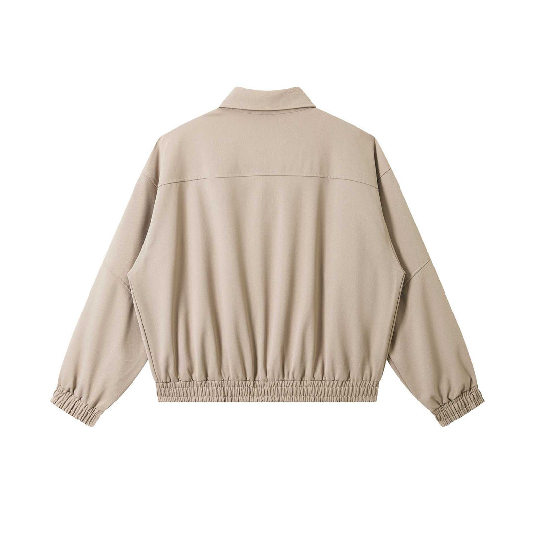 Unisex Kurz geschnittene technische Blousonjacke mit verdeckter Frontblende und elastischem Saum Echoarchiv