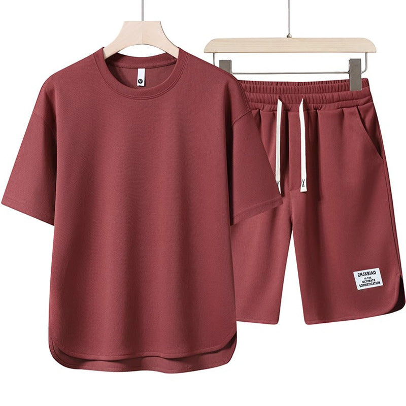 Unisex lässiges Set aus T-Shirt und Shorts mit seitlichen Taschen und elastischem Bund Echoarchiv