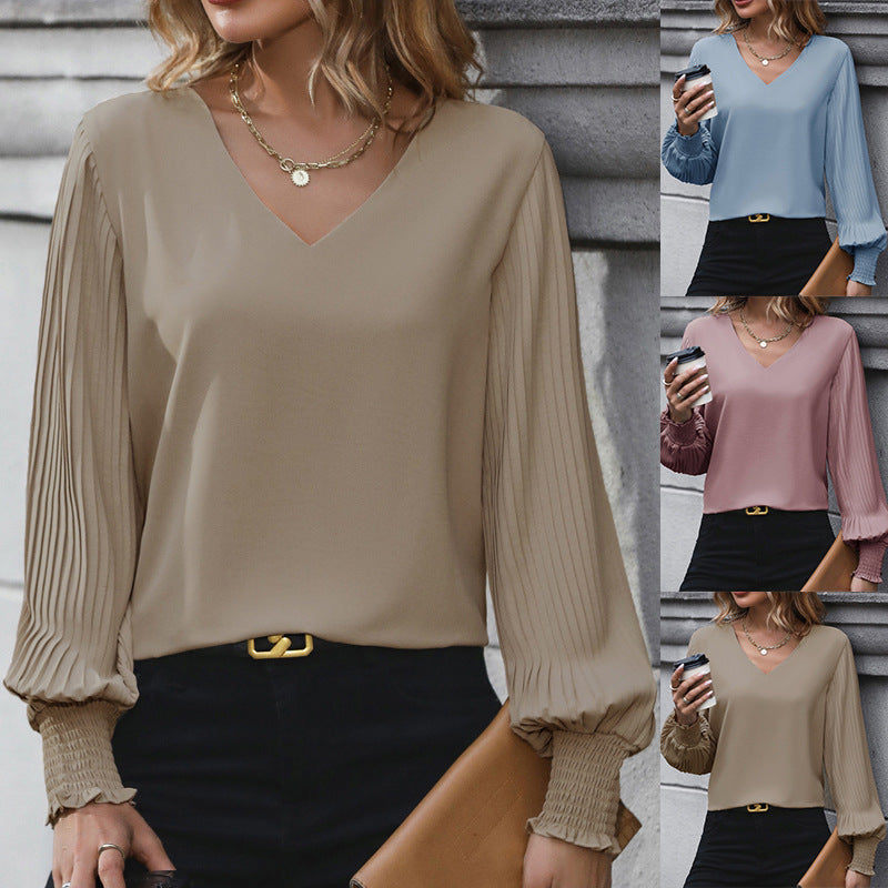 Damen Feminine V-Ausschnitt-Bluse mit plissierten Ballonärmeln und Smokmanschetten Echoarchiv