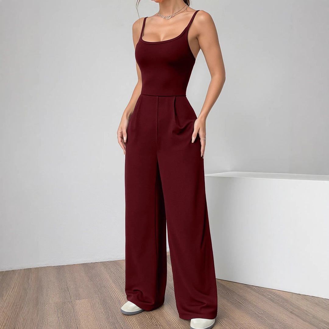 Damen Eleganter Jumpsuit mit weitgeschnittenen Beinen und schmeichelndem Oberteil Echo Archiv