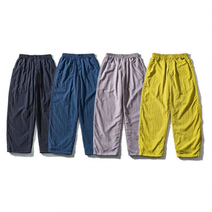 Unisex Weite Crinkle-Hose mit elastischem Tunnelzugbund, tiefem Schritt und Seitentaschen Echo Archiv