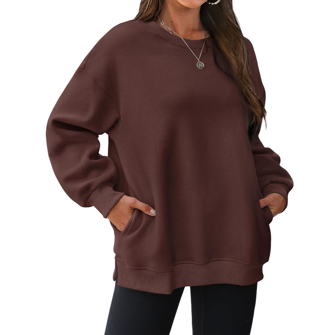 Damen verlängertes Oversize Rundhalspullover mit seitlichen Eingrifftaschen, Rippbündchen und überschnittener Schulter – Mavelle