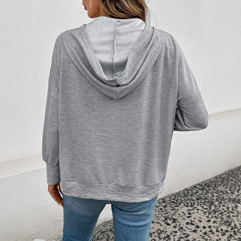Damen lässiger Waffel-Kapuzenpullover mit Henley-Knopfleiste und Kängurutasche Echoarchiv