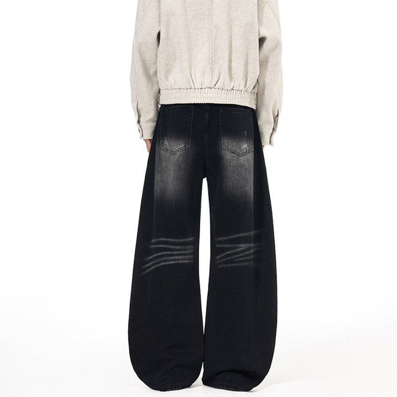 Herren Ultraweite Denim-Palazzohose mit skulpturalen Seitenbahnen und Used‑Effekt Echo Archiv