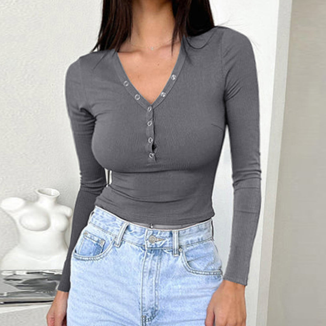 Damen tailliertes Ripp-Langarmshirt mit dekorativer Knopfleiste und Metallösen – Avérine