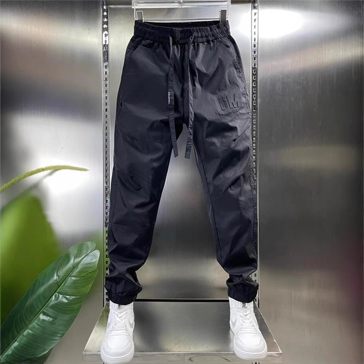 Herren Funktionale wasserabweisende Sporthose Echo Archiv