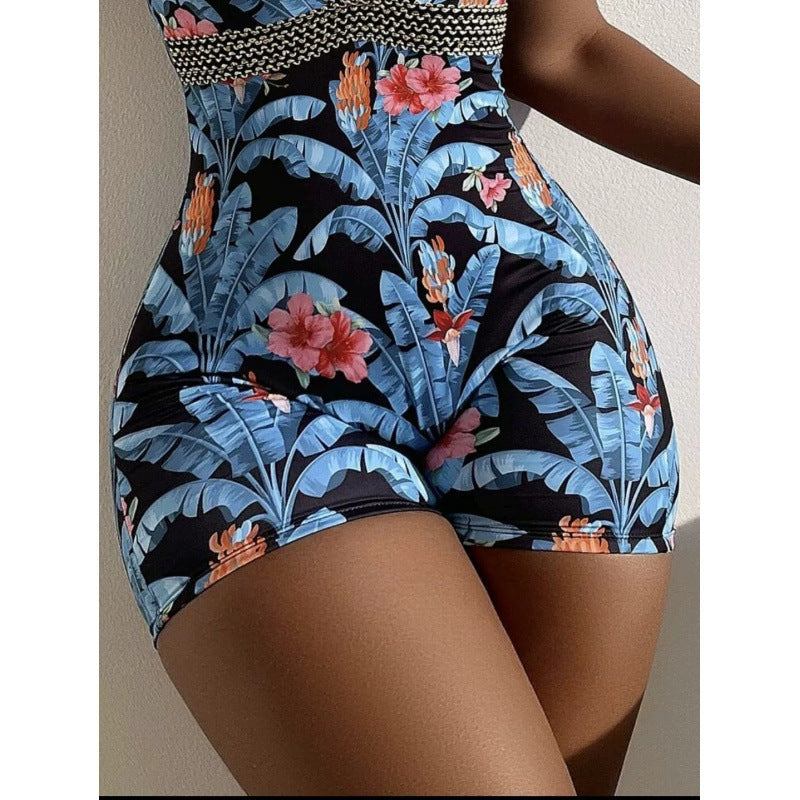 Damen Einteiliger Badeanzug mit tiefem V-Ausschnitt und modischem floralem Design Echo Archiv