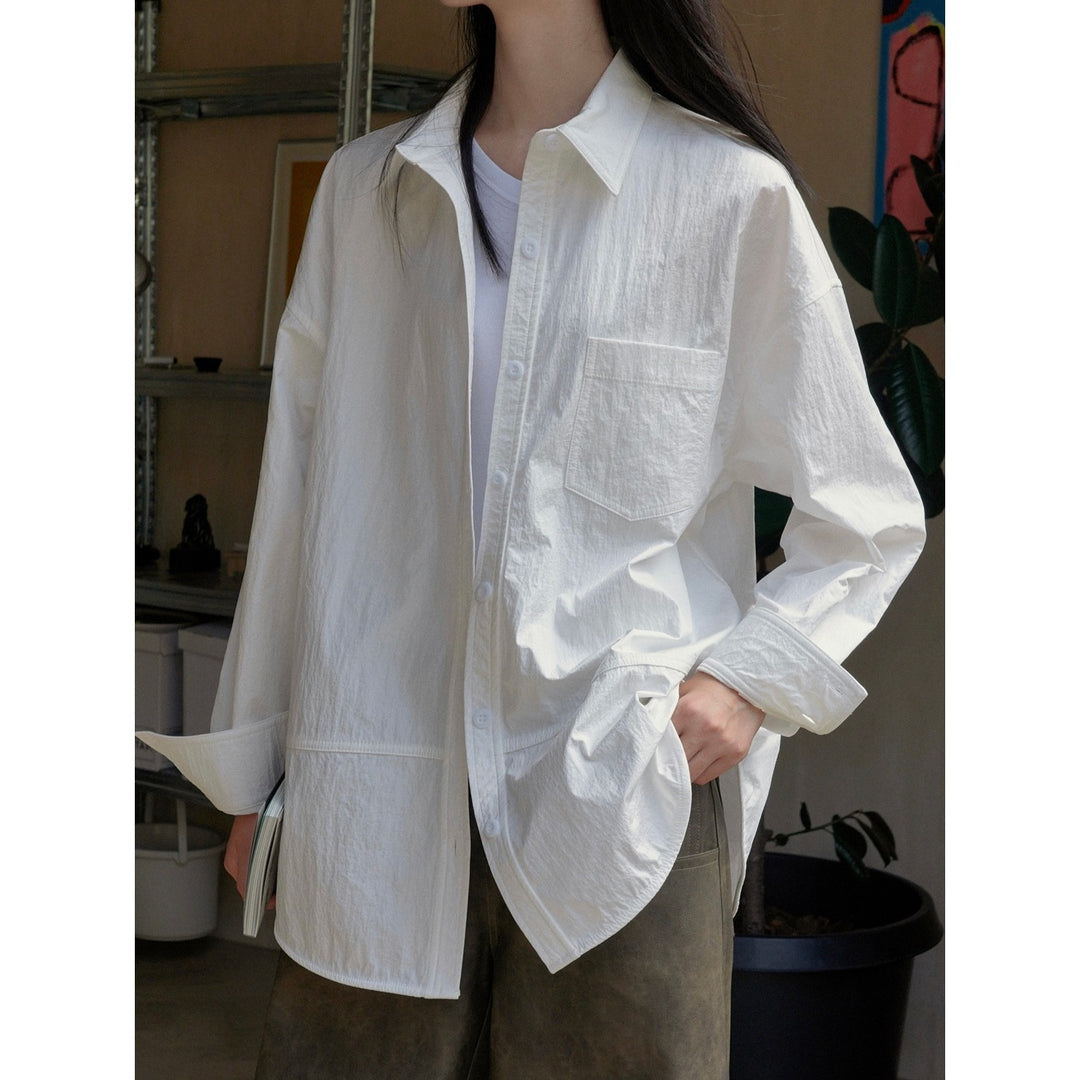 Damen Oversized Baumwoll‑Hemd mit Brusttasche und gerundetem Saum Echoarchiv