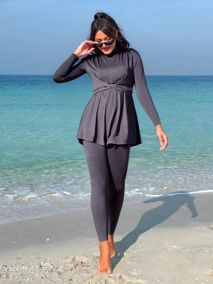 Damen modischer Longsleeve-Badeanzug mit Wickelrock Echo Archiv