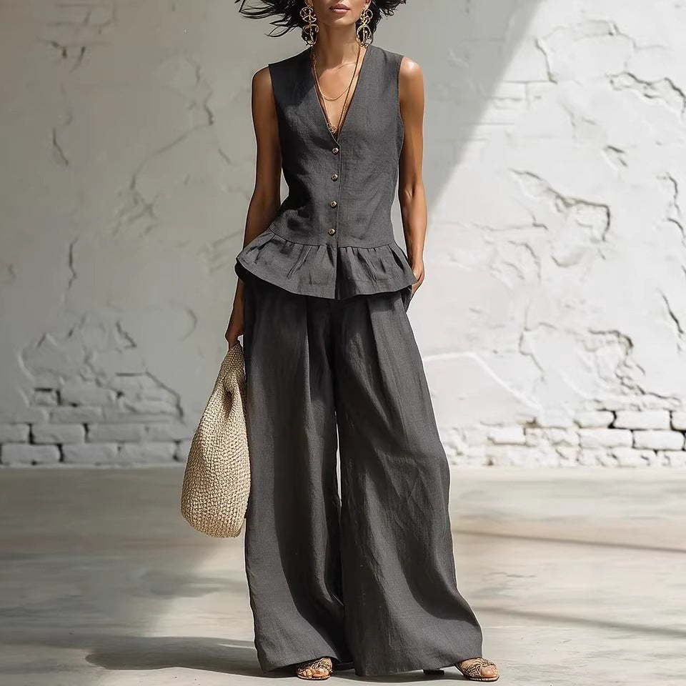 Damen lässiger Jumpsuit mit peplum Schnitt und Knopfdetails Echo Archiv