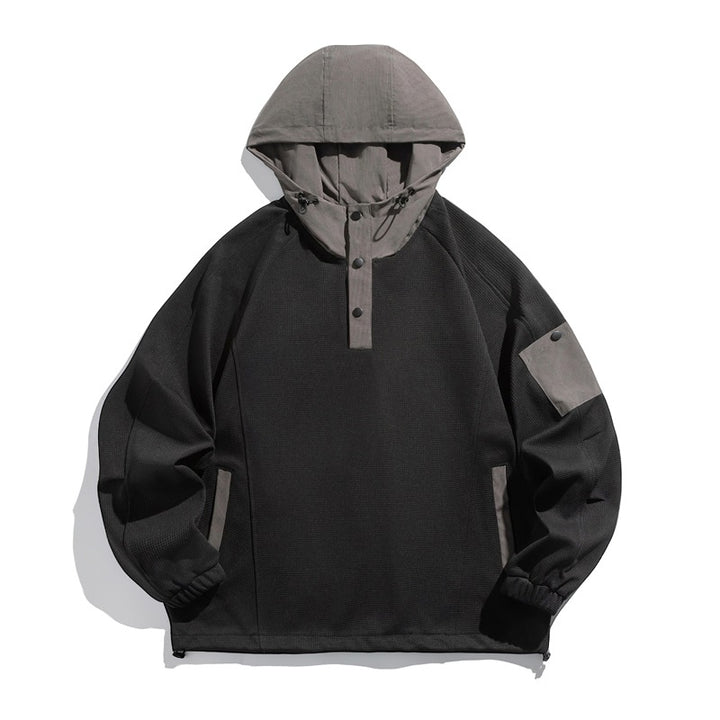 Unisex Oversize Kapuzen-Anorak-Pullover mit halber Druckknopfleiste, Utility-Ärmeltasche und Thermostruktur Echoarchiv