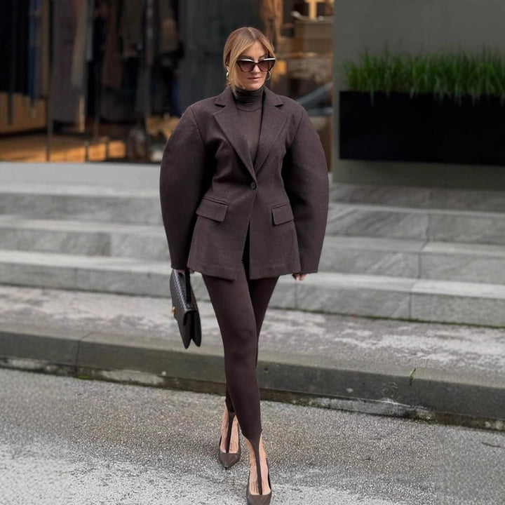 Damen Oversize-Strukturblazer mit betonter Schulterpartie und voluminösen Ärmeln Echoarchiv