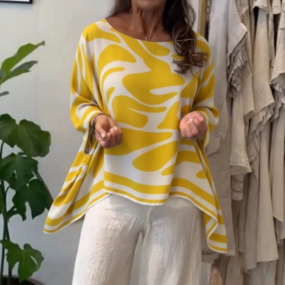 Damen Oversize Sommerbluse mit abstraktem Print, Fledermausärmeln und asymmetrischem Saum – Élovi