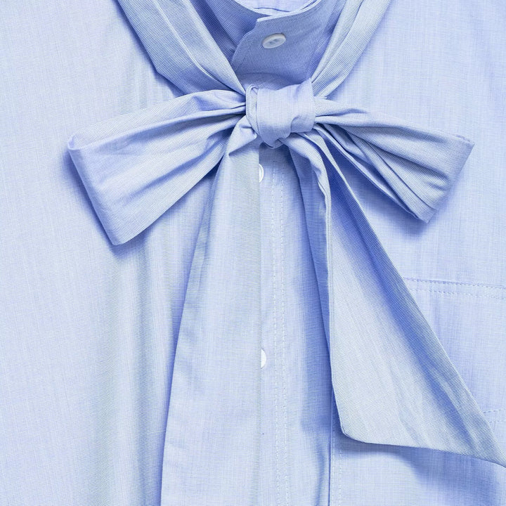 Damen Bluse mit Schleifenkragen und oversized Boxy‑Schnitt Echoarchiv