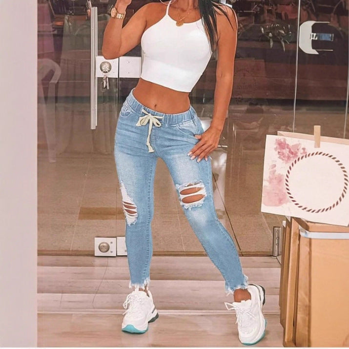 Damen Hochtaillierte Slim-Jogger-Jeans mit Destroyed-Einsätzen und Kordelzug Echo Archiv