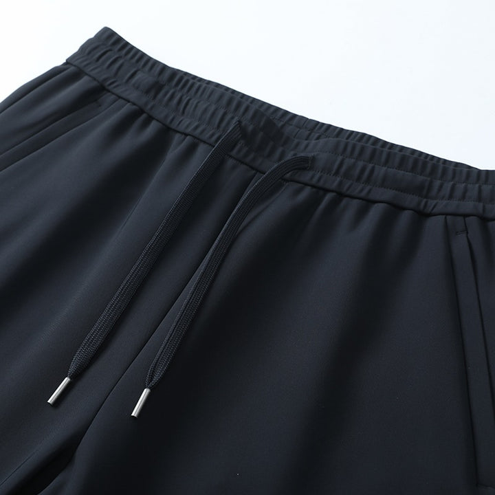 Herren Atmungsaktive Performance-Jogginghose mit geradem Bein, elastischem Komfortbund & verdeckten Seitentaschen Echoarchiv