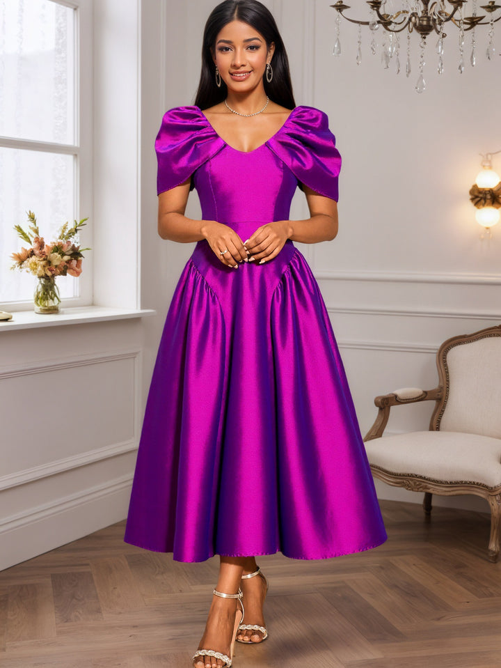 Damen elegantes Midikleid mit voluminösen Puffärmeln und schwingendem Rock Echo Archiv