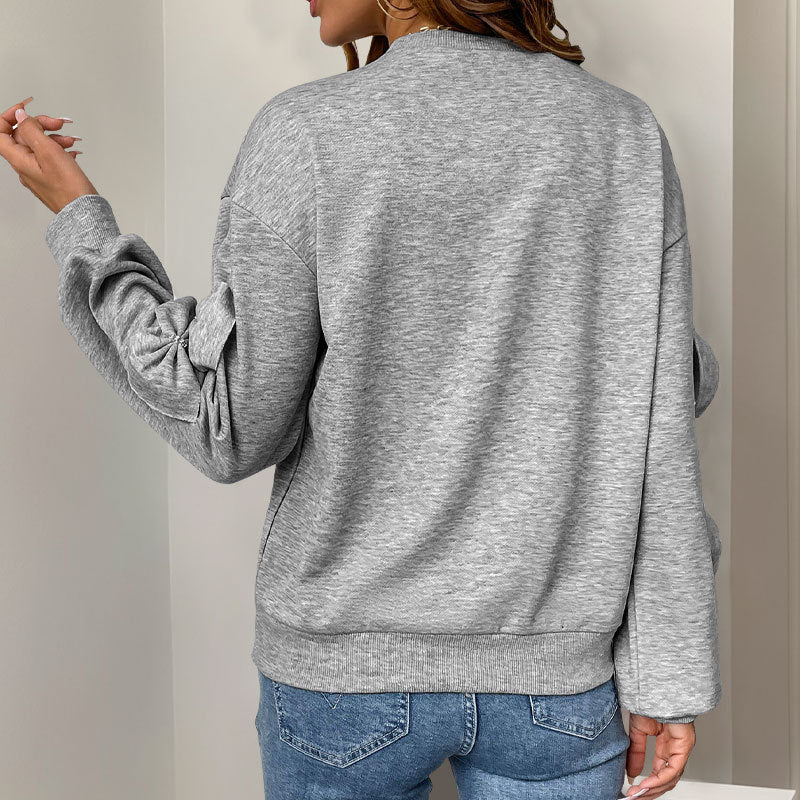 Damen Kuschel-Sweatshirt mit 3D-Schleifenapplikationen, Rundhals & Rippbündchen Echoarchiv