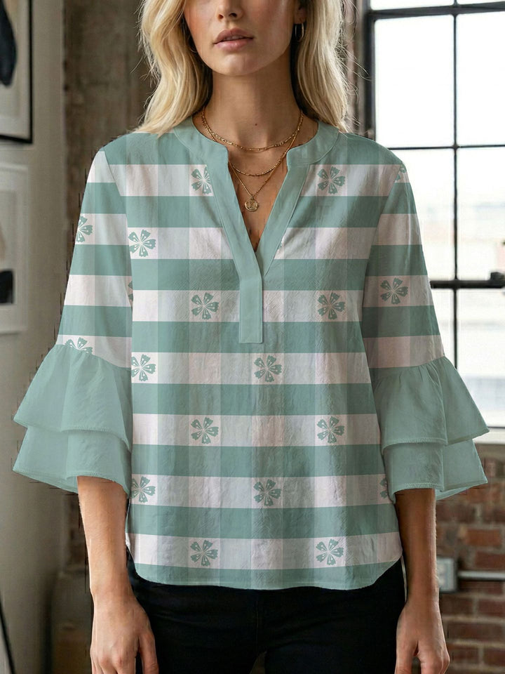 Damen Blusenshirt mit voluminösen Ärmeln und kreativem Druckdesign Echo Archiv