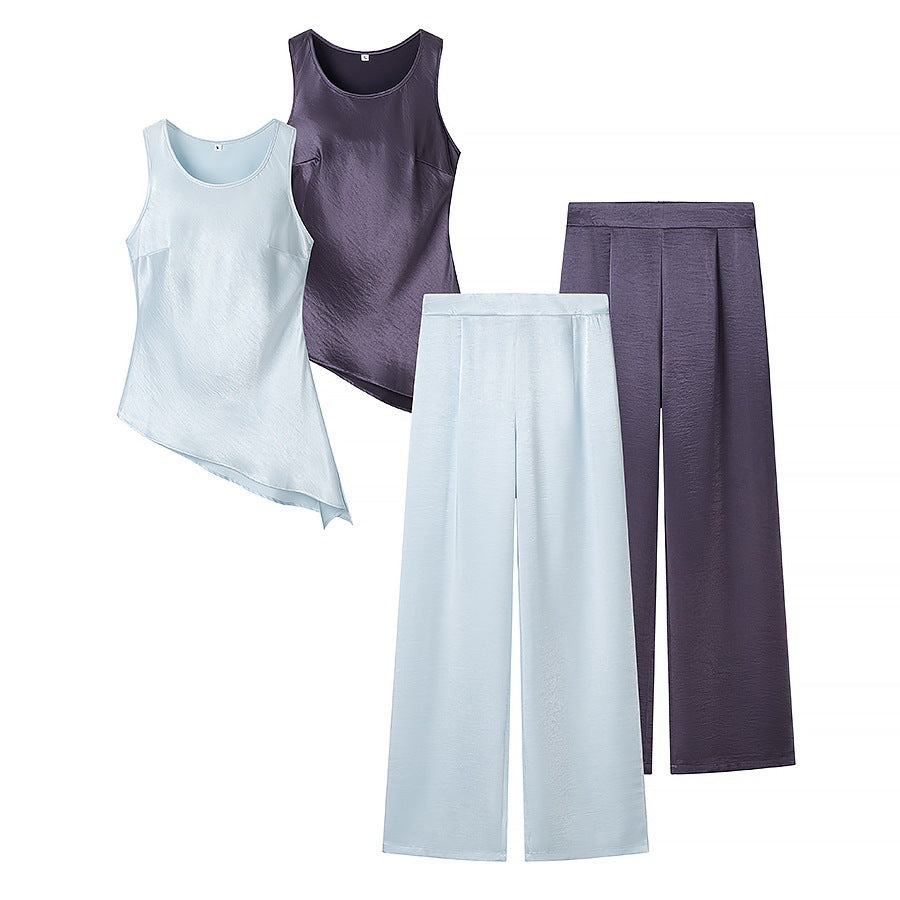 Damen Set bestehend aus elegantem Oberteil mit asymmetrischem Saum und weit geschnittener Hose Echo Archiv