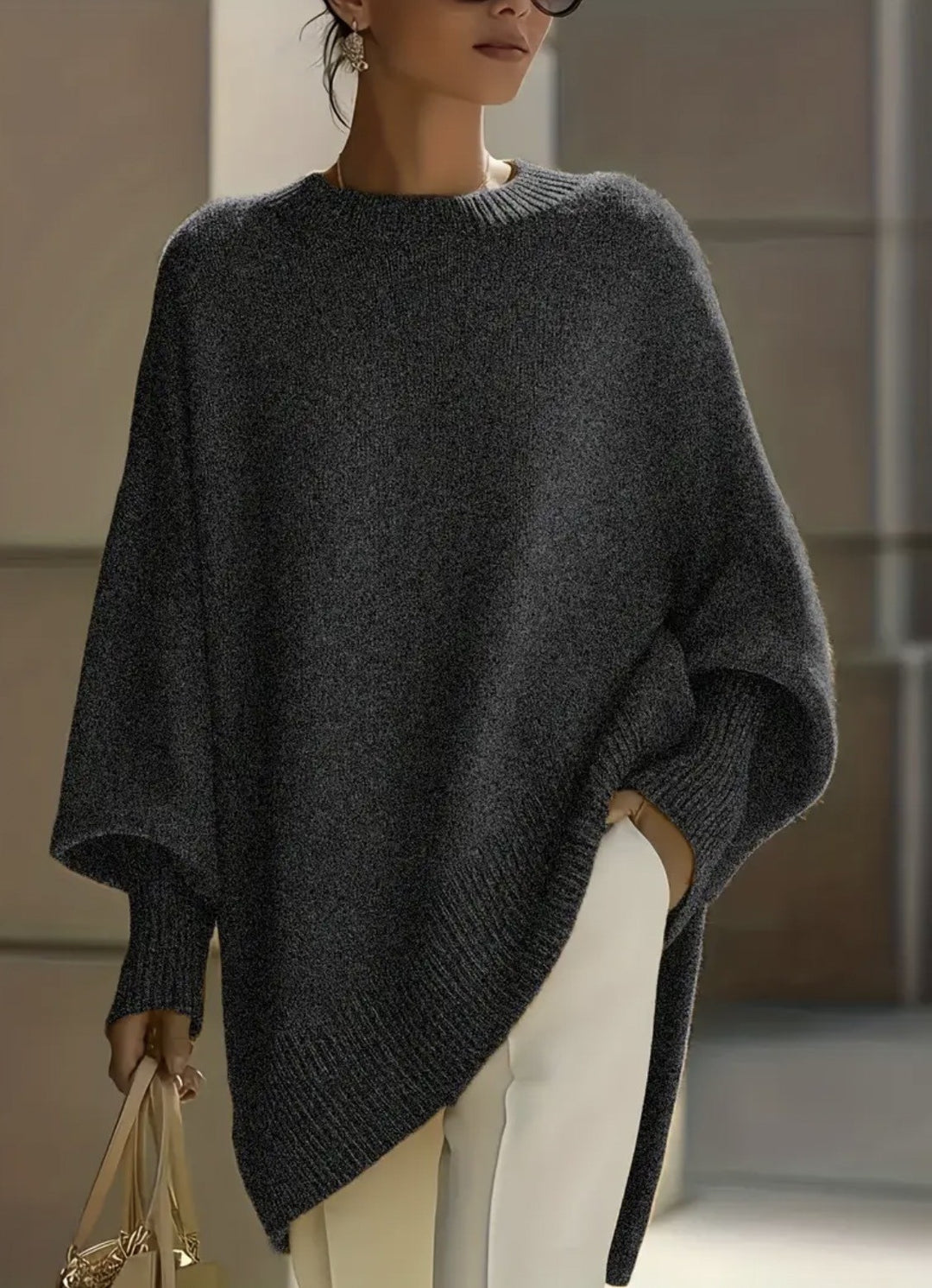 Damen nan Oversize Strickponcho mit asymmetrischem Saum und gerippten Ärmeln Echo Archiv