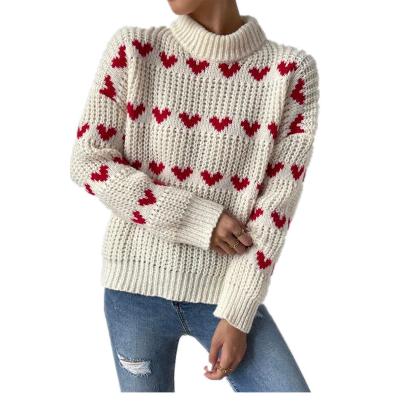 Damen nan Grobstrickpullover mit eingestrickten Herzmotiven, hohem Stehkragen und lässiger Oversize-Silhouette Echo Archiv