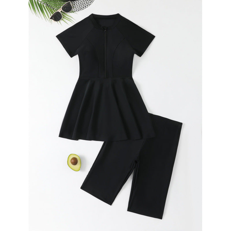 Damen Sportlicher Schwimmanzug mit femininem Rock-Design und kurzer Raglanärmel Echo Archiv