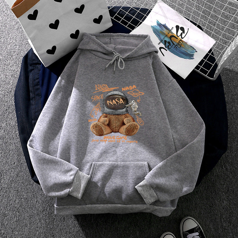 Damen lässiger Hoodie mit Astronauten‑Teddy‑Print, Kängurutasche und weichem Fleece-Innenfutter – Auréline