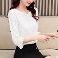 Damen Elegante Bluse mit Puffärmeln Echoarchiv