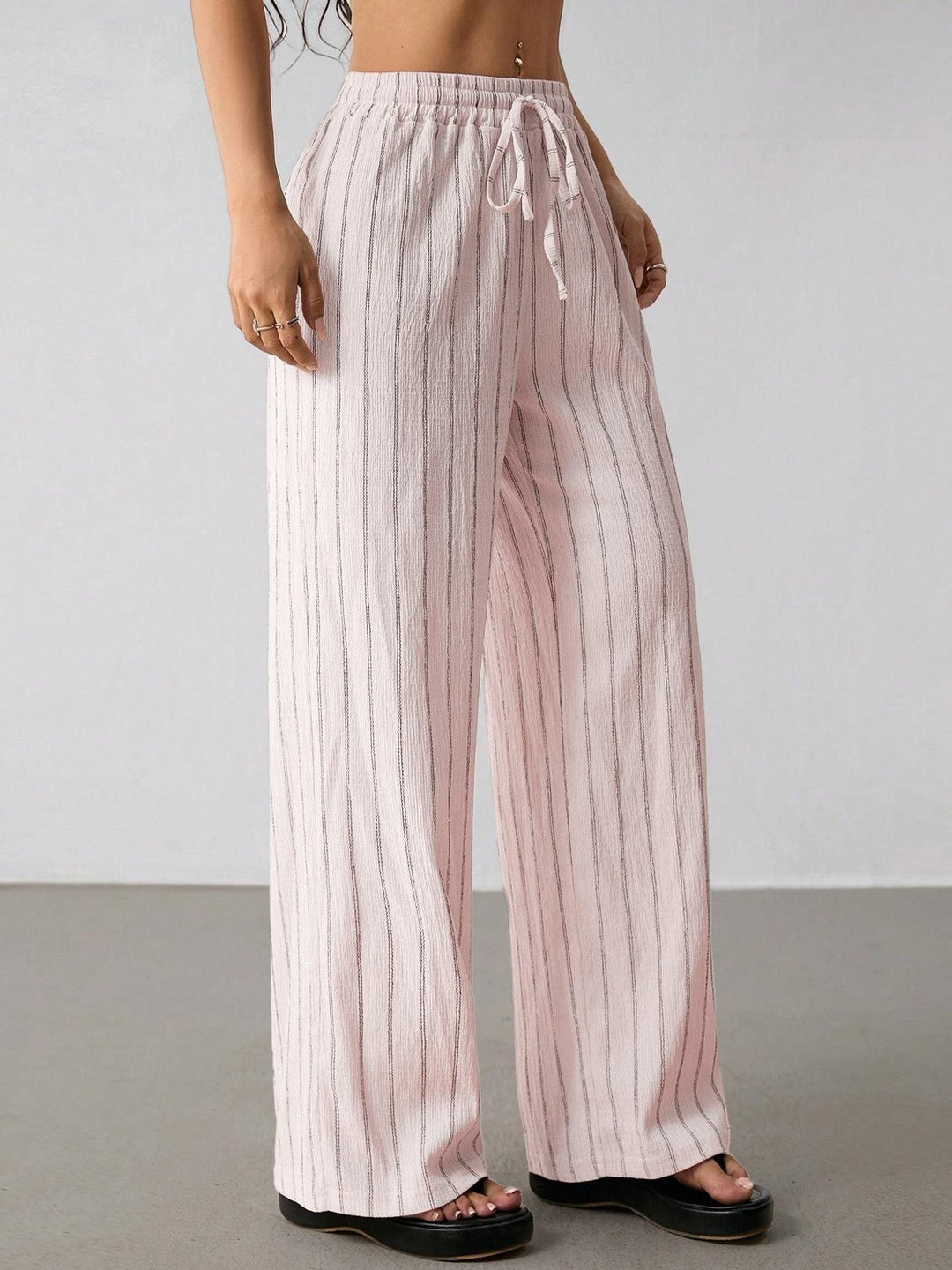 Damen Weite Strickhose mit hohem Bund und Kordelzug Echo Archiv